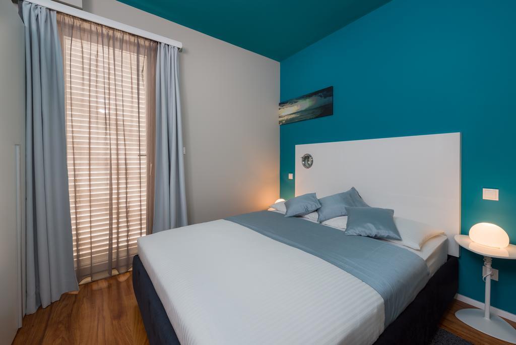Apartments Villa Azzurra Bol Cameră foto